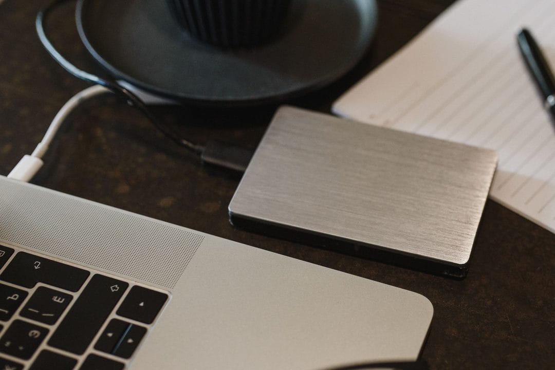 Portable external hard drive / SSD on a desk