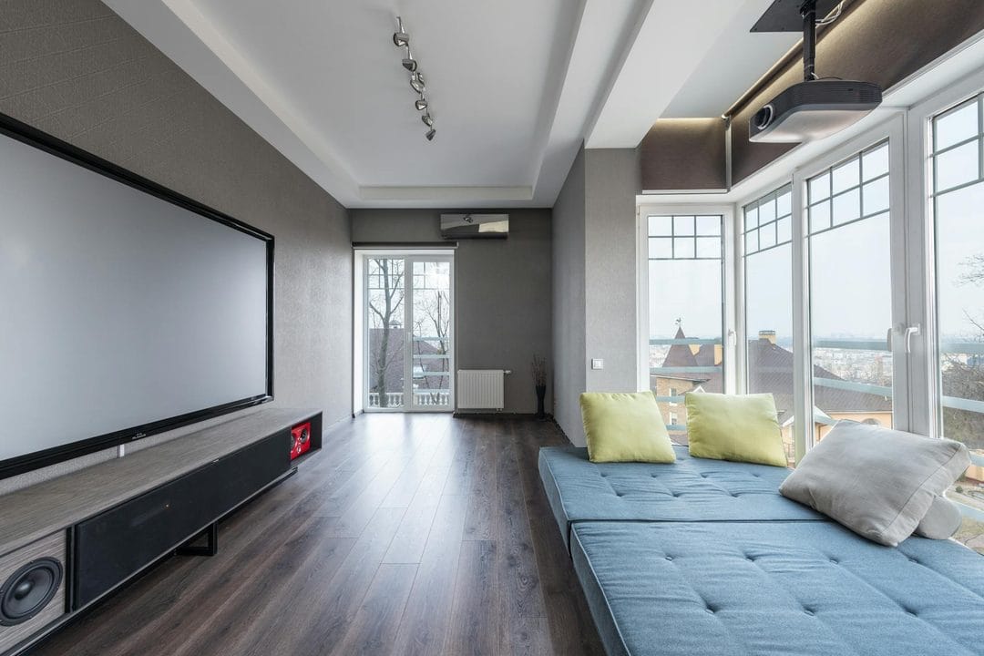 The 2026 Home Projector Upgrade: Why Laser Beats LCD for Men Who Want a 100-Inch Screen Without the Renovation